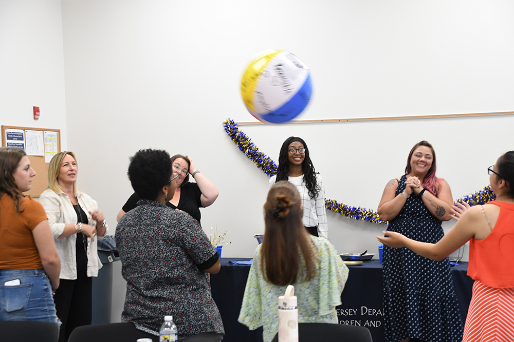 NJYRS members hitting a beach ball